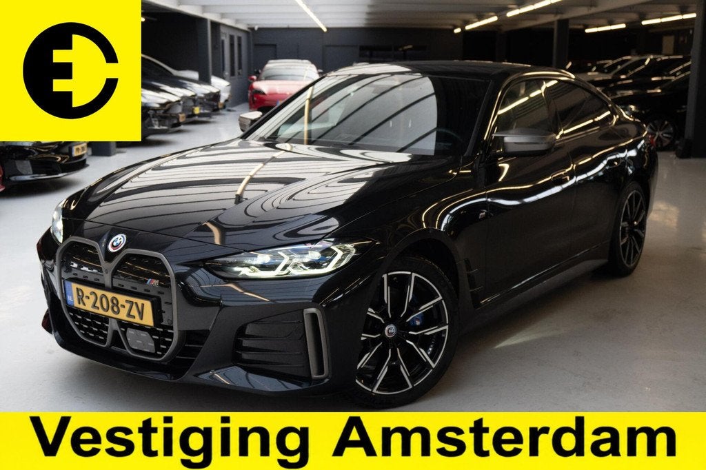 BMW i4 M50 High Executive 84 kWh | Stuurverwarming | 97,1% S, Auto's, BMW, Gebruikt, Zwart, 110 €/maand, Automatische klimaatregeling