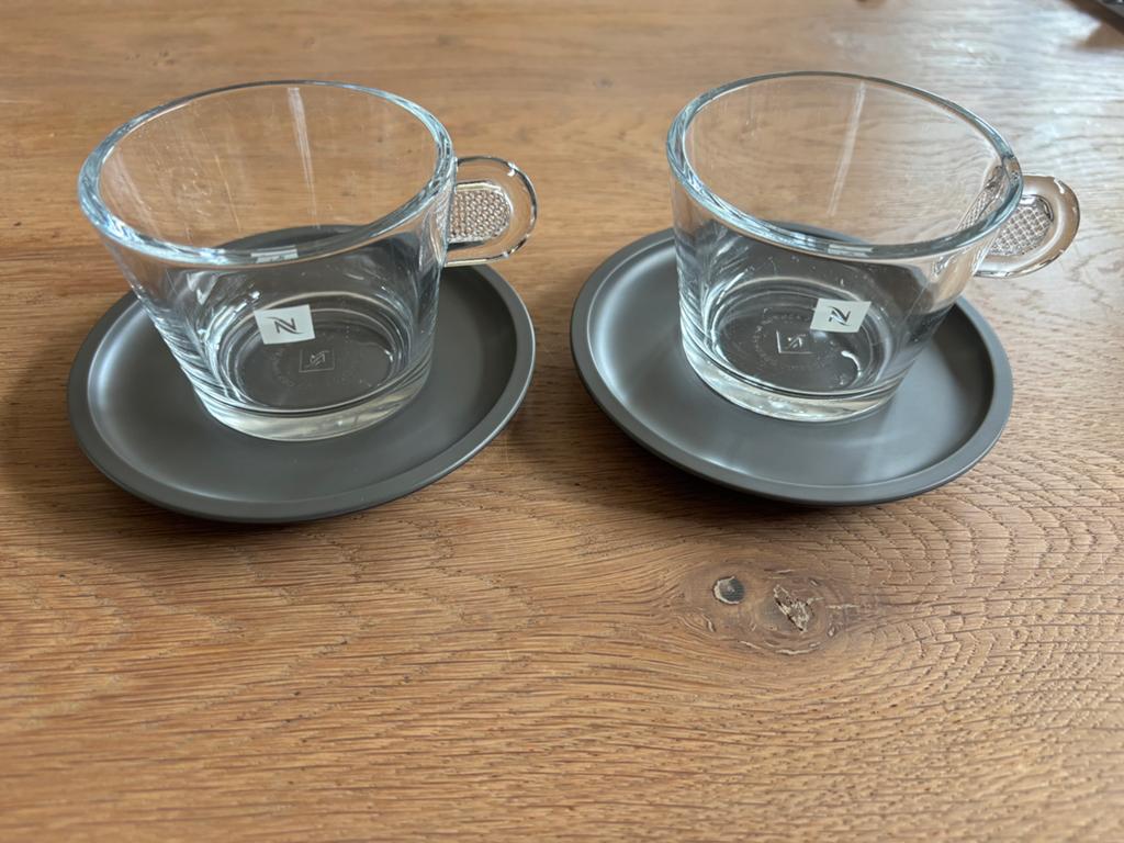 Nespresso kopjes en schotel (glas), Ophalen of Verzenden, Zo goed als nieuw, Overige materialen