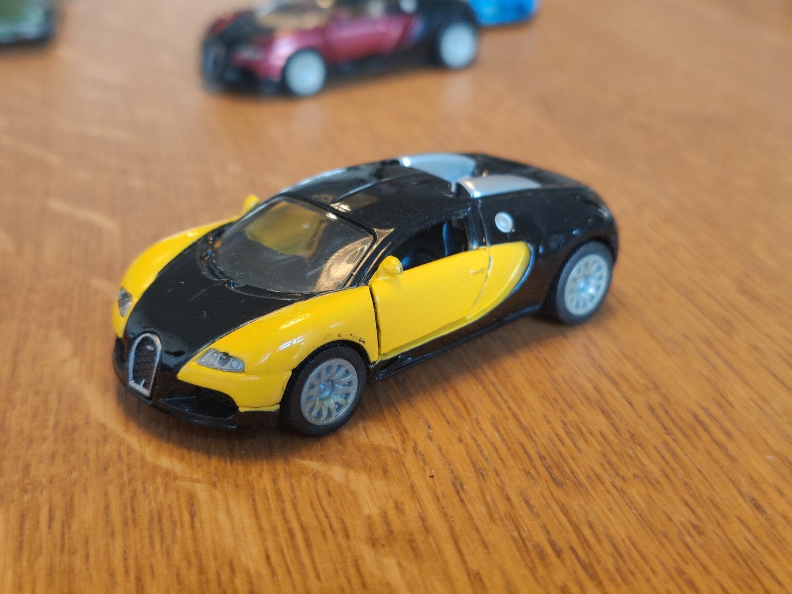 Siku Bugatti Veyron GEEL, Hobby en Vrije tijd, Ophalen, Zo goed als nieuw, Auto