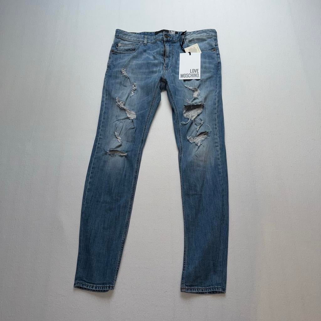 Love Moschino spijkerbroek met gaten 34, Kleding | Heren, Ophalen of Verzenden, Zo goed als nieuw, Blauw