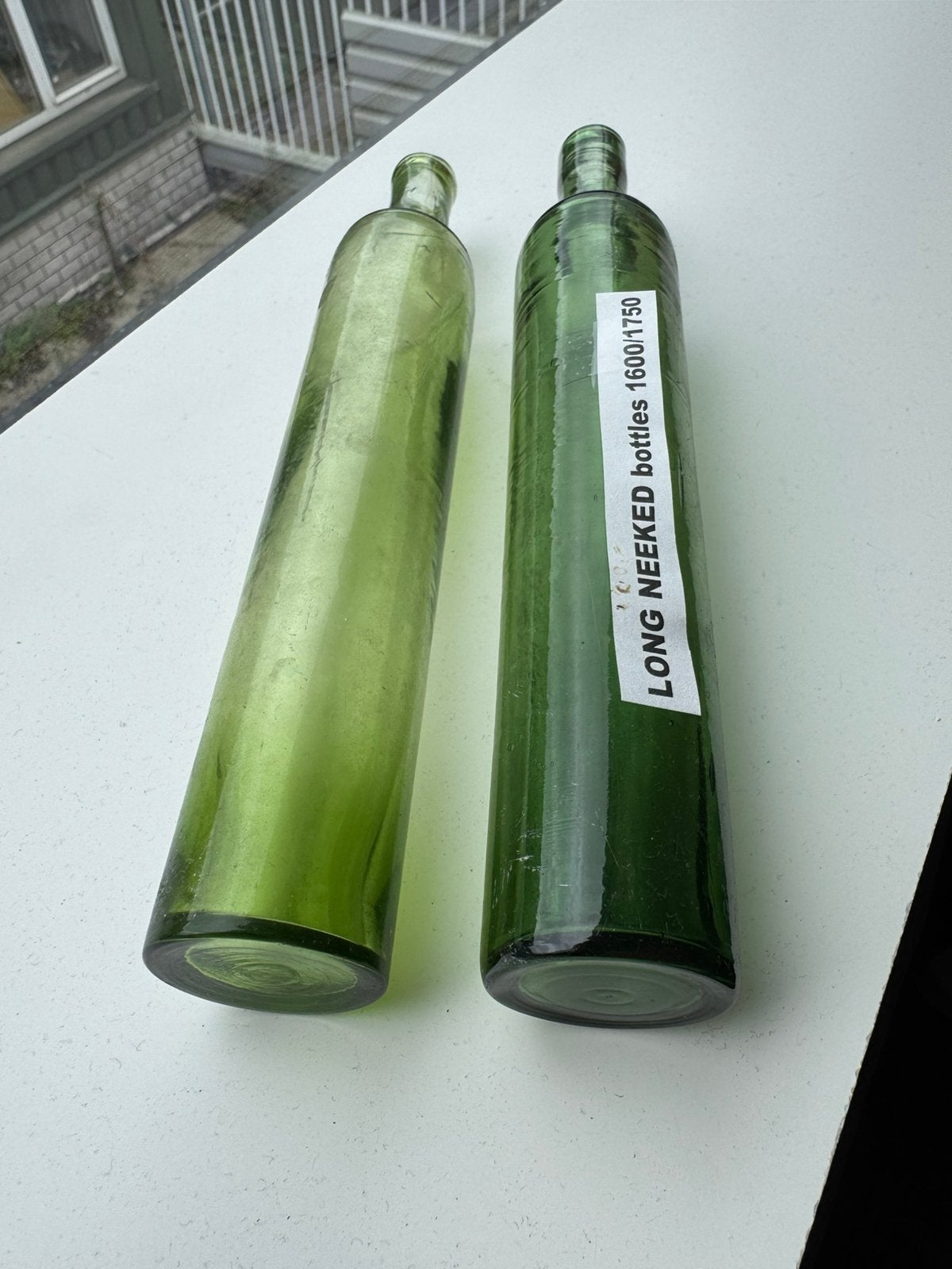 2 Bodemvondst 1750 1900 Long-necked bottles Haarlemmer olie, Ophalen of Verzenden
