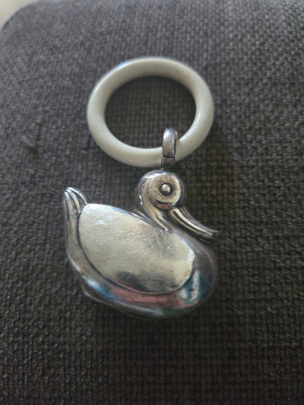 Een zilveren rammelaar  als " Eendje " Vintage, Ophalen of Verzenden, Meisje