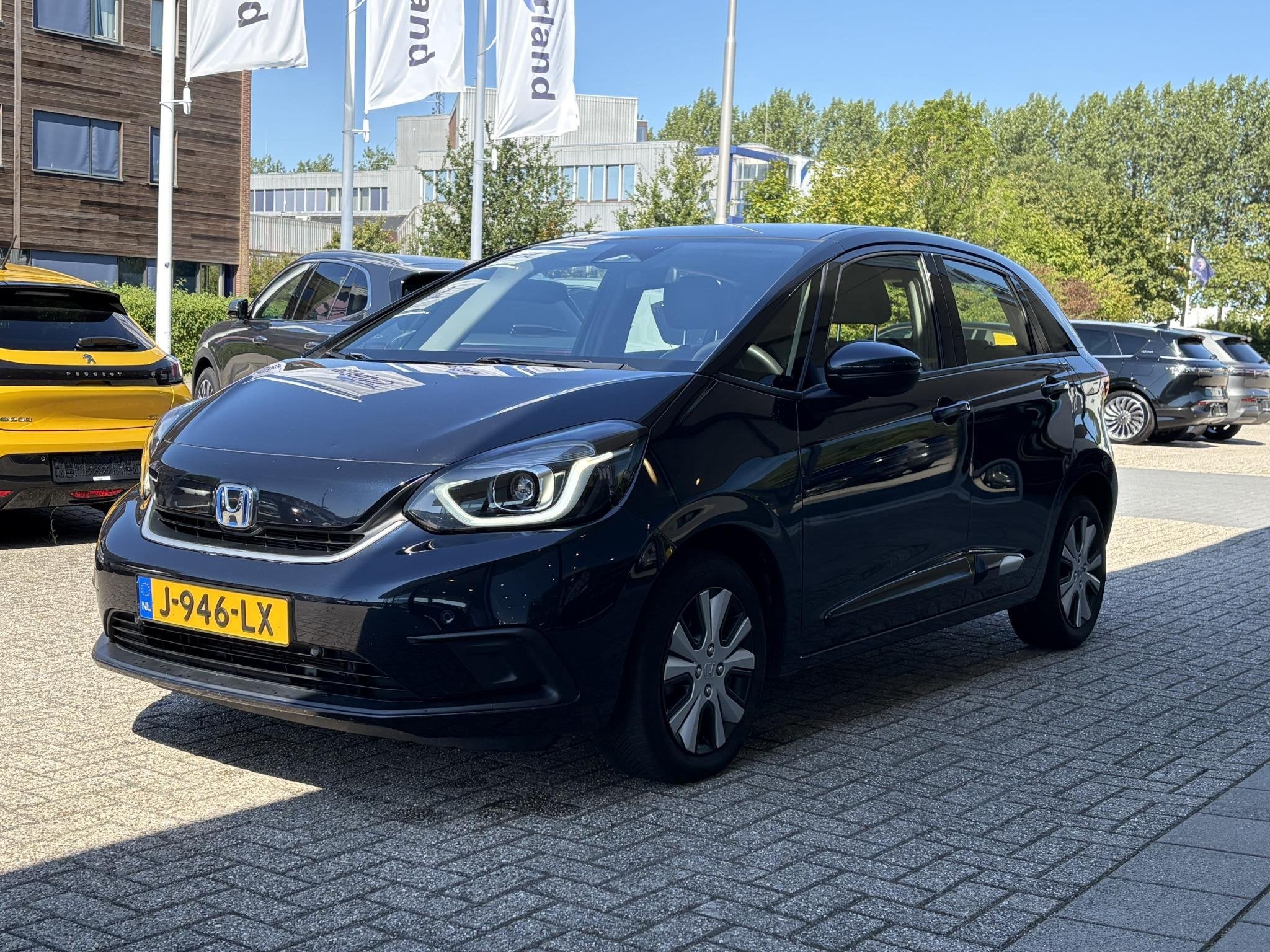 Honda Jazz 1.5 e:HEV Elegance | Stoelverwarming | Cruise con, Euro 6, Blauw, Leder en Stof, Origineel Nederlands