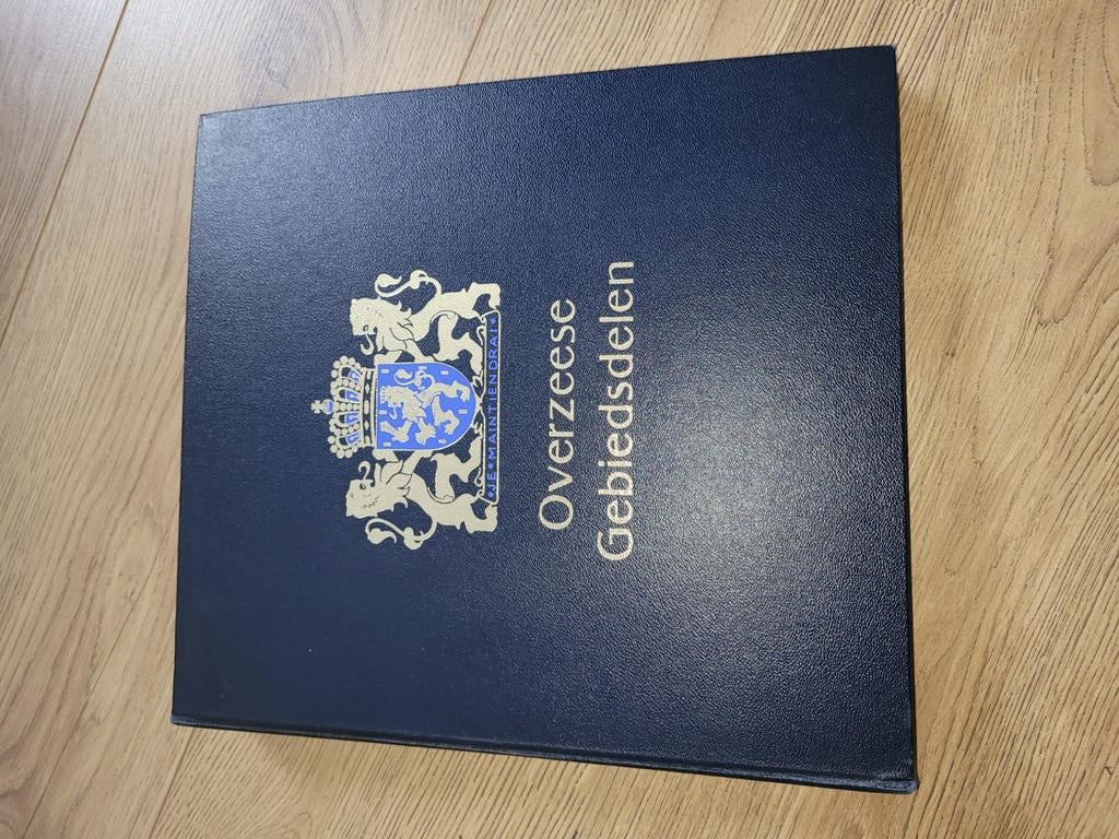 Davo album postzegels Nederland overzee met veel inhoud, Ophalen of Verzenden