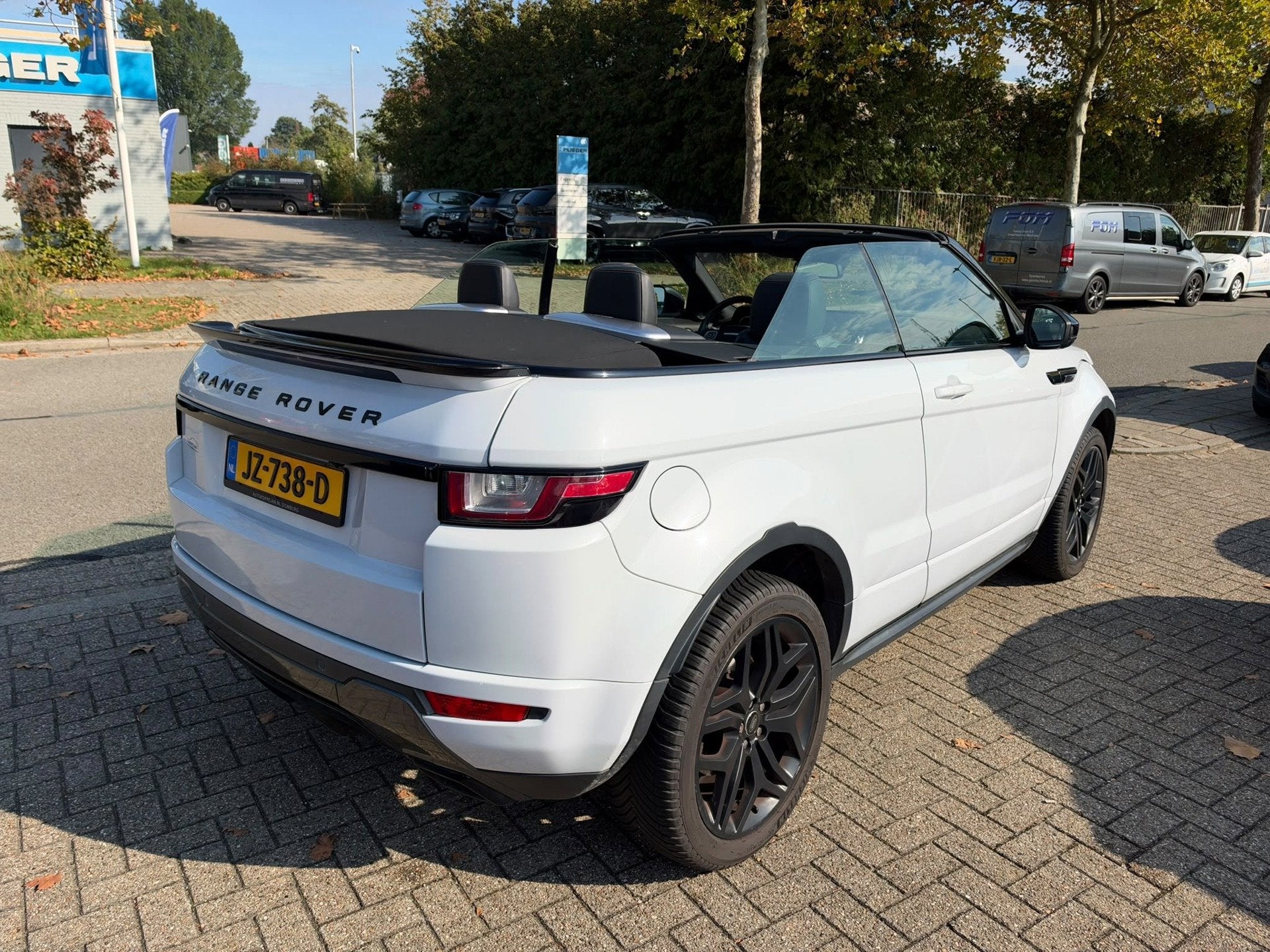 Land Rover Range Rover Evoque Convertible 2.0 Si4 HSE Dynami, Auto's, Dealer onderhouden, Gebruikt, 4 cilinders, Cabriolet
