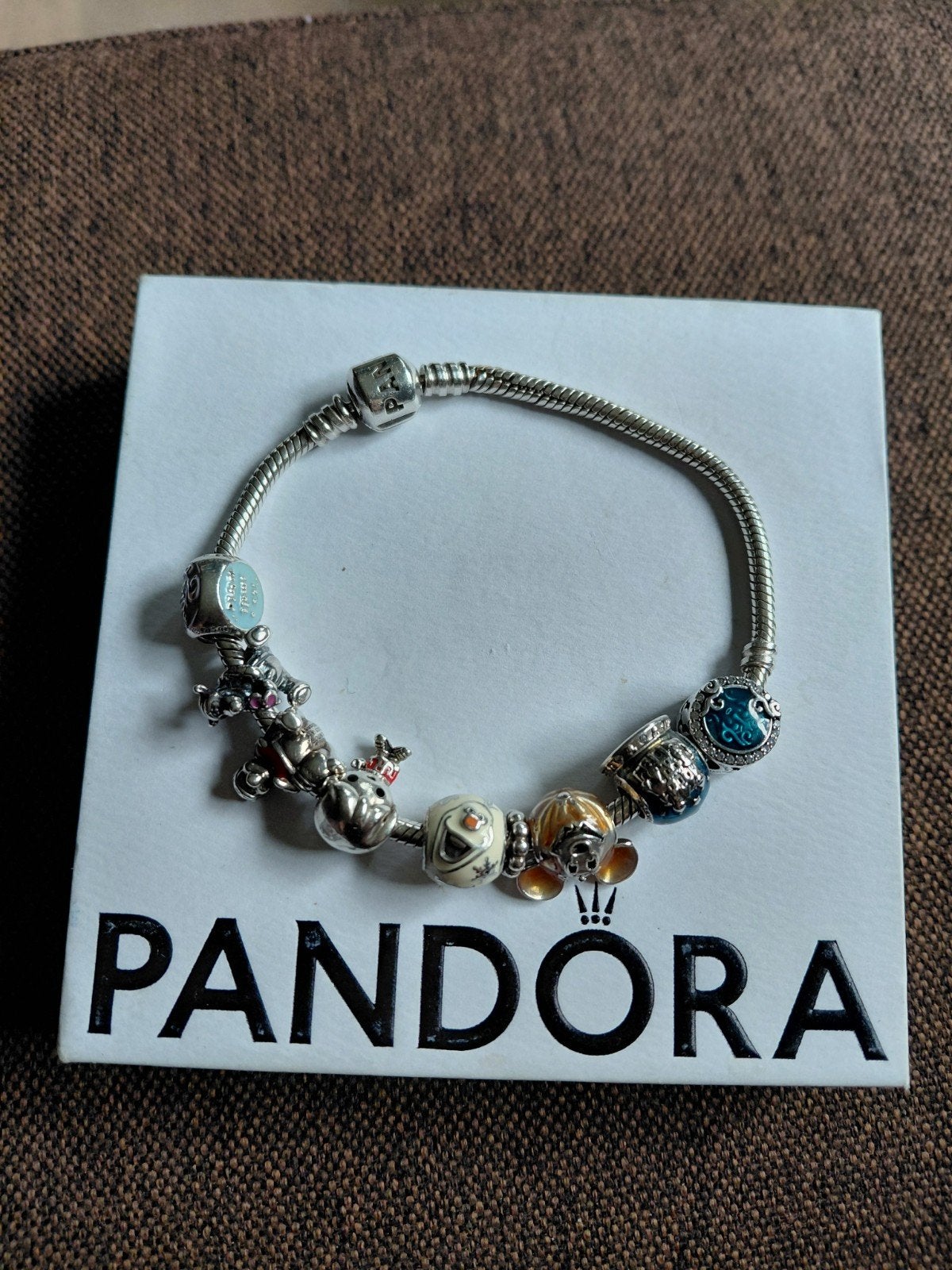 Pandora armband met Disney bedels waaronder Disney Parks, Met bedels of kralen, Ophalen of Verzenden, Zo goed als nieuw, Zilver