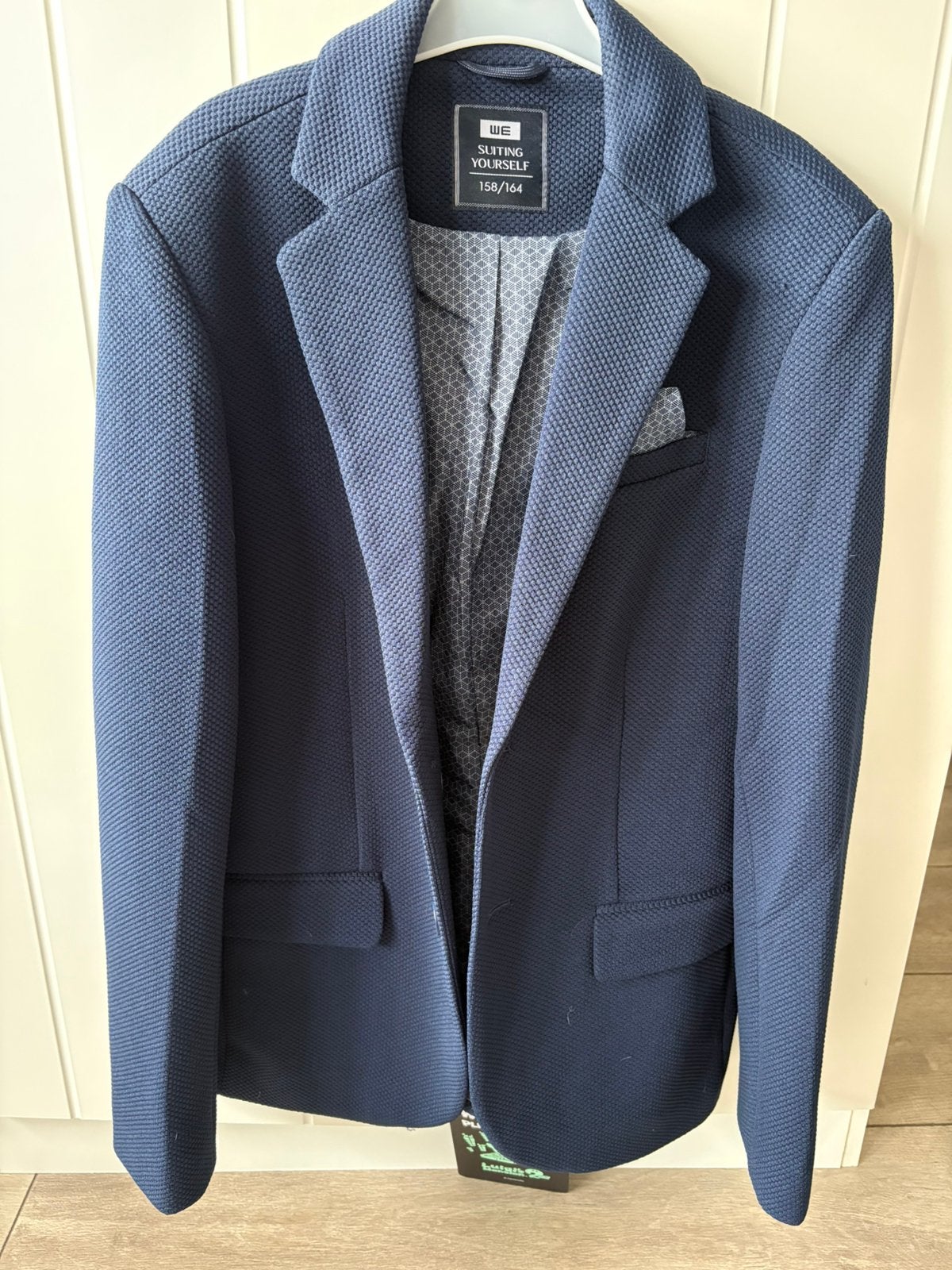 Donkerblauw colbert, blazer mt 158-164 WE Fashion, Kinderen en Baby's, Kinderkleding | Maat 158, Ophalen of Verzenden, Zo goed als nieuw