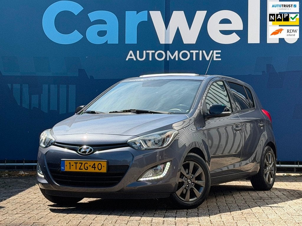 Hyundai I20 1.2i Go! Plus |1e Eigenaar|Pano|Navi|Airco|Cruis, Euro 5, Gebruikt, 4 cilinders, Leder en Stof