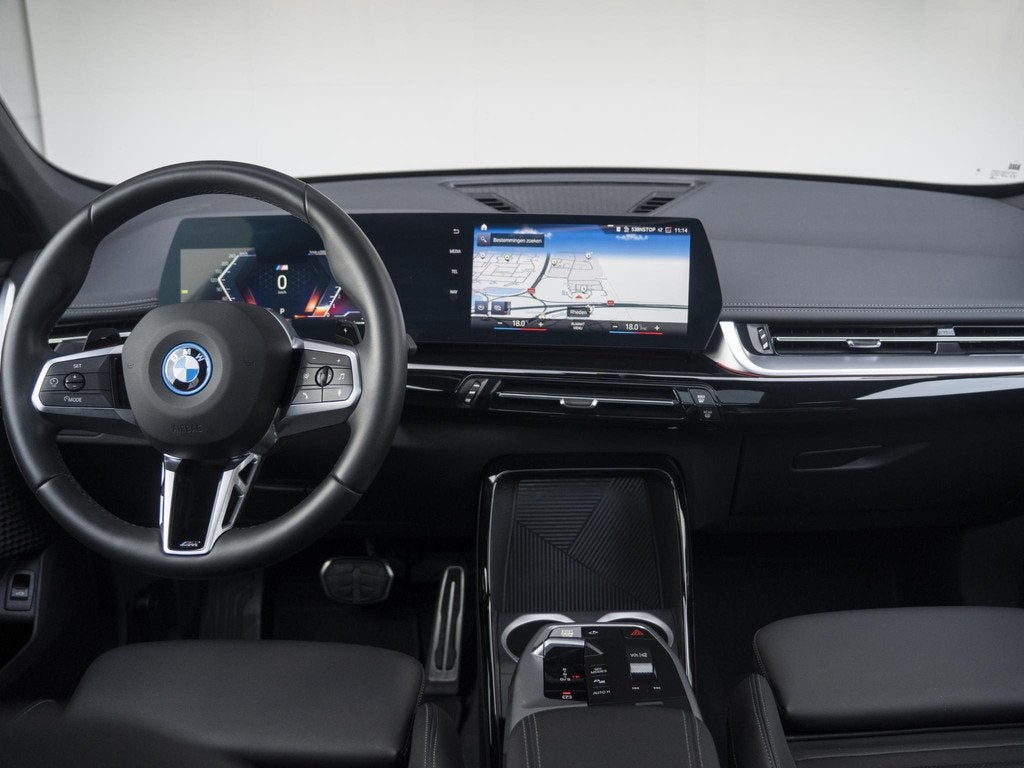 BMW X1 xDrive25e | M Sportpakket | Travel Pack | Achteruitri, Auto's, BMW, Gebruikt, Bedrijf, Vierwielaandrijving, Hybride Elektrisch/Benzine