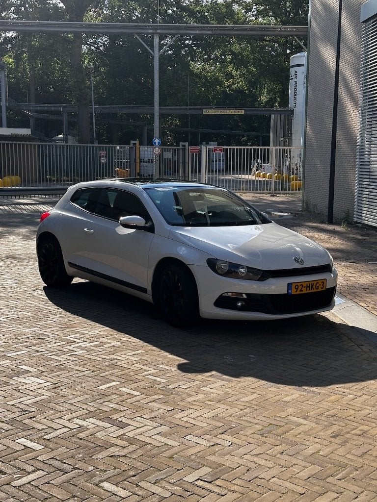 Volkswagen Scirocco 2.0 TSI 200pk DSG — gereviseerde motor, Zwart, 4 cilinders, 1984 cc, 4 stoelen