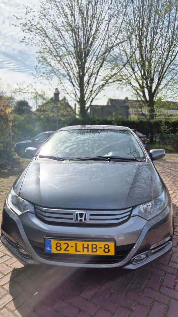 Honda Insight 1.3 Hybrid AUT 2010 Grijs, Auto's, Honda, 4 cilinders, 22 km/l, Zilver of Grijs, Adaptieve lichten