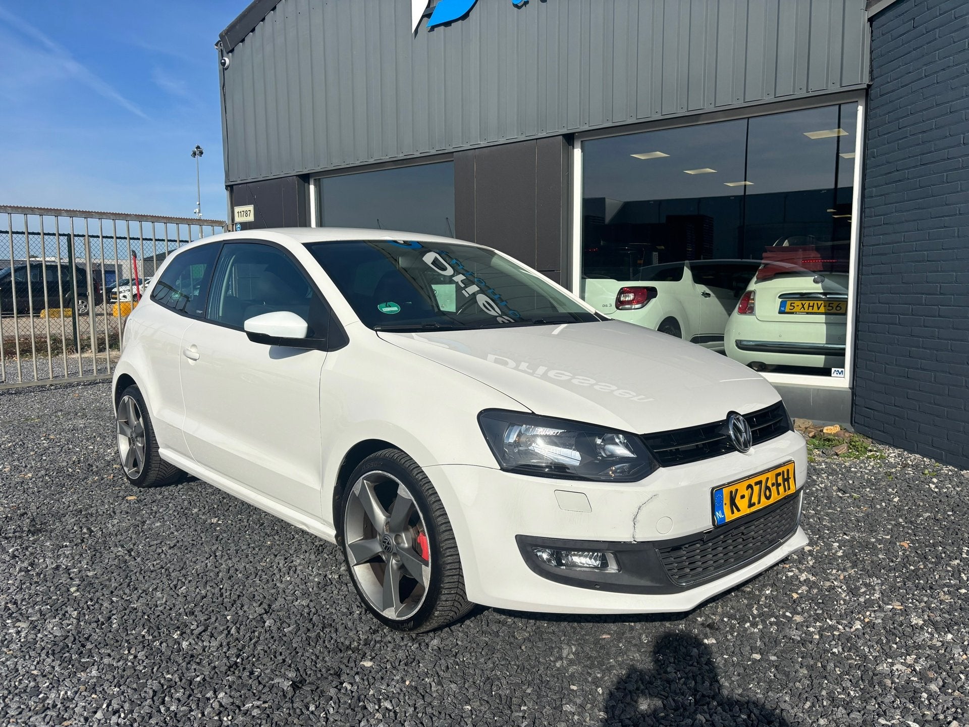 Volkswagen Polo 1.2-12V Comfortline | Airco | Navi/Bleutooth, Auto's, Voorwielaandrijving, Zwart, 1198 cc, Wit