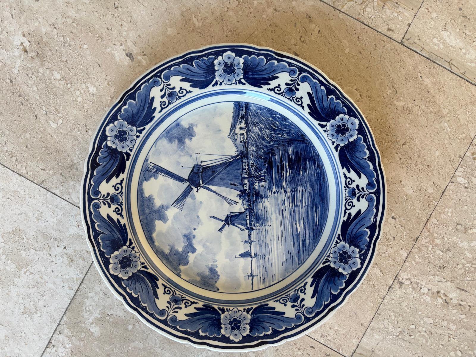 Delftsblauw bord, Ophalen