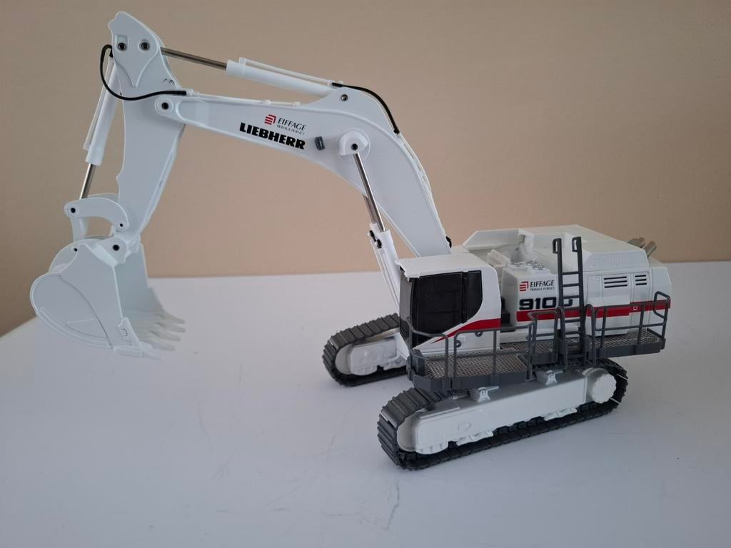 Liebherr 9100 dieplepel van EIFFAGE van Conrad., Hobby en Vrije tijd, Modelauto's | 1:50, Ophalen of Verzenden, Nieuw, Hijskraan, Tractor of Landbouw