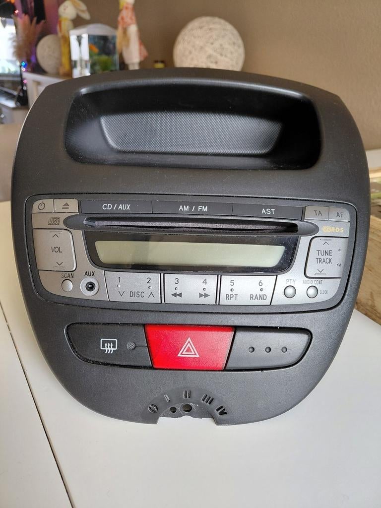 Originele Autoradio Peugeot 107 - CD/AUX/AM/FM, Auto diversen, Autoradio's, Ophalen, Gebruikt
