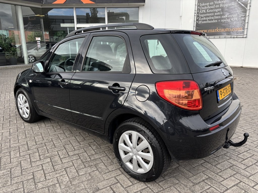 Suzuki SX4 1.6 Comfort met Airco en Trekhaak (bj 2010), Voorwielaandrijving, Euro 5, Stof, Gebruikt