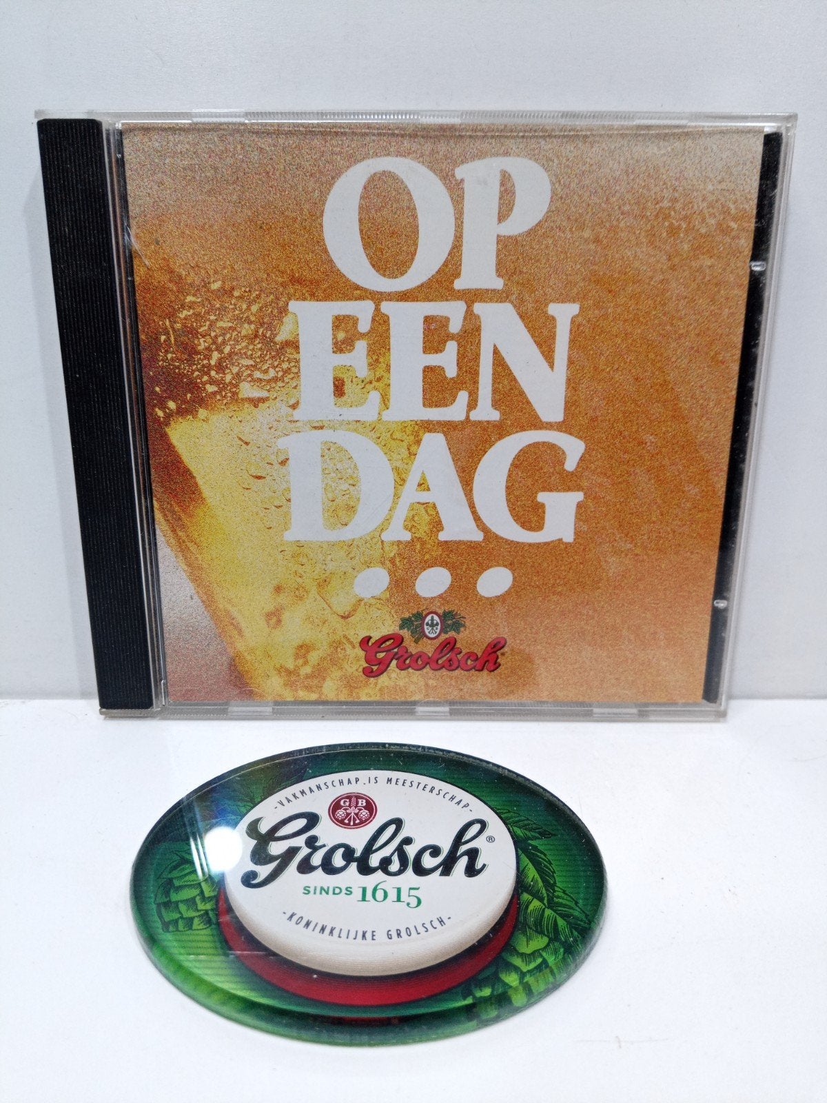 Grolsch CD 'Op Een Dag' met taplens., Cd's en Dvd's, Ophalen of Verzenden, Zo goed als nieuw