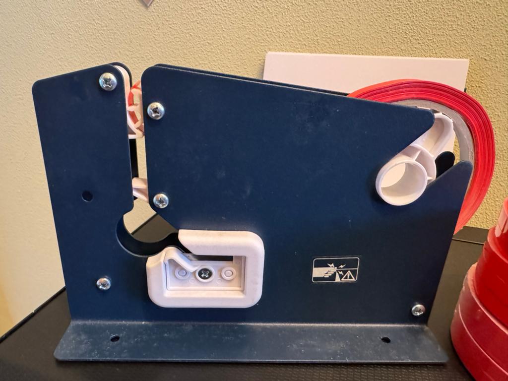 Zakkensluiter met rode tape rollen.Sealapparaat, Ophalen of Verzenden, Gebruikt, Overige typen