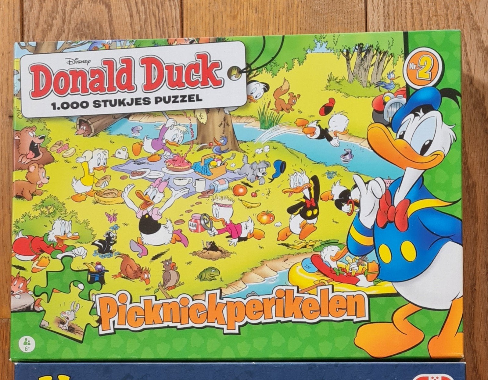 2 Donald Duck puzzels 1000 stukjes. 1 puzzel mist 1 stukje, Ophalen of Verzenden, 500 t/m 1500 stukjes, Gebruikt
