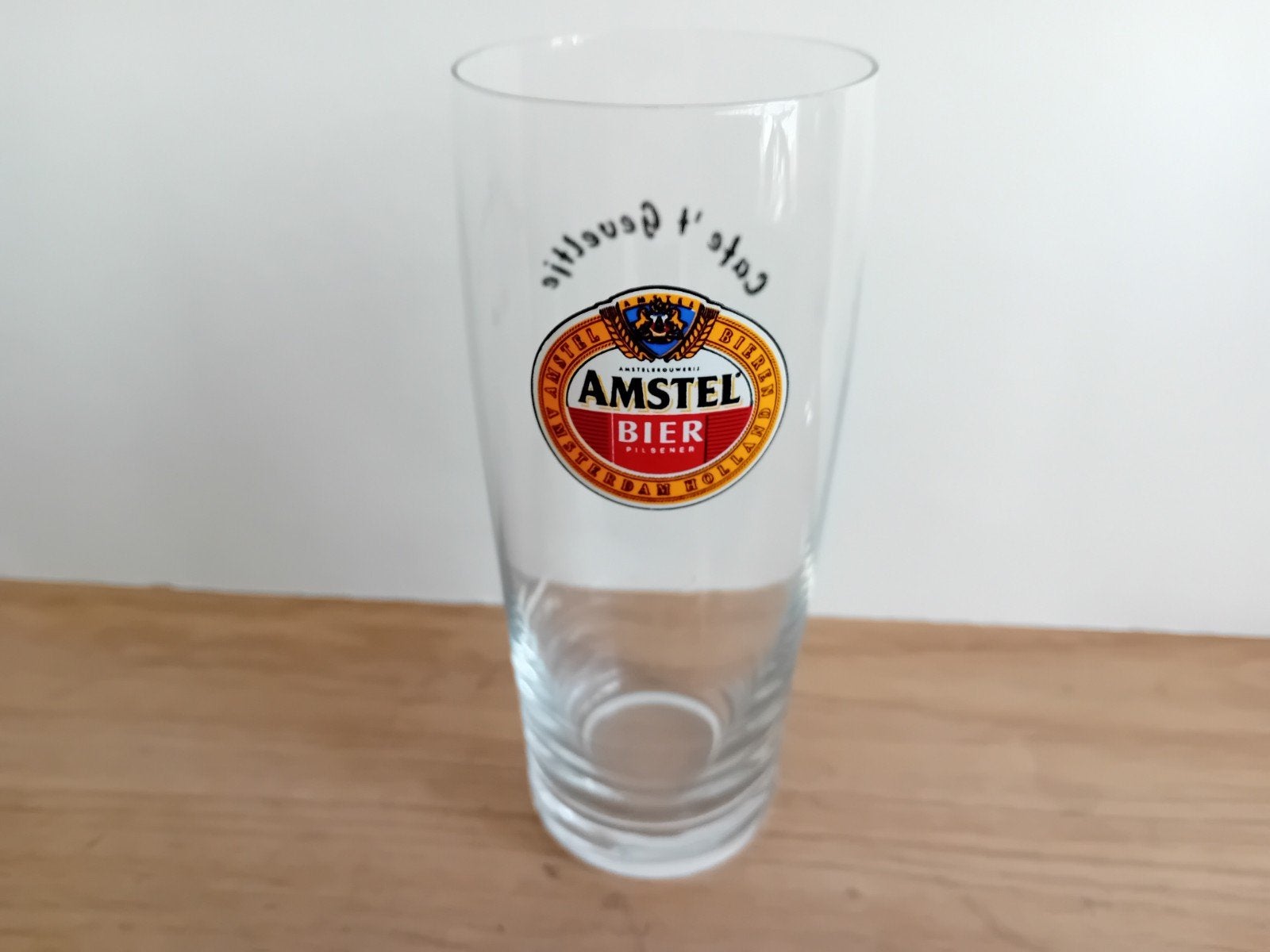 Amstel glas nummer 10 met achteropdruk, Verzamelen, Ophalen of Verzenden, Zo goed als nieuw, Glas of Glazen, Amstel