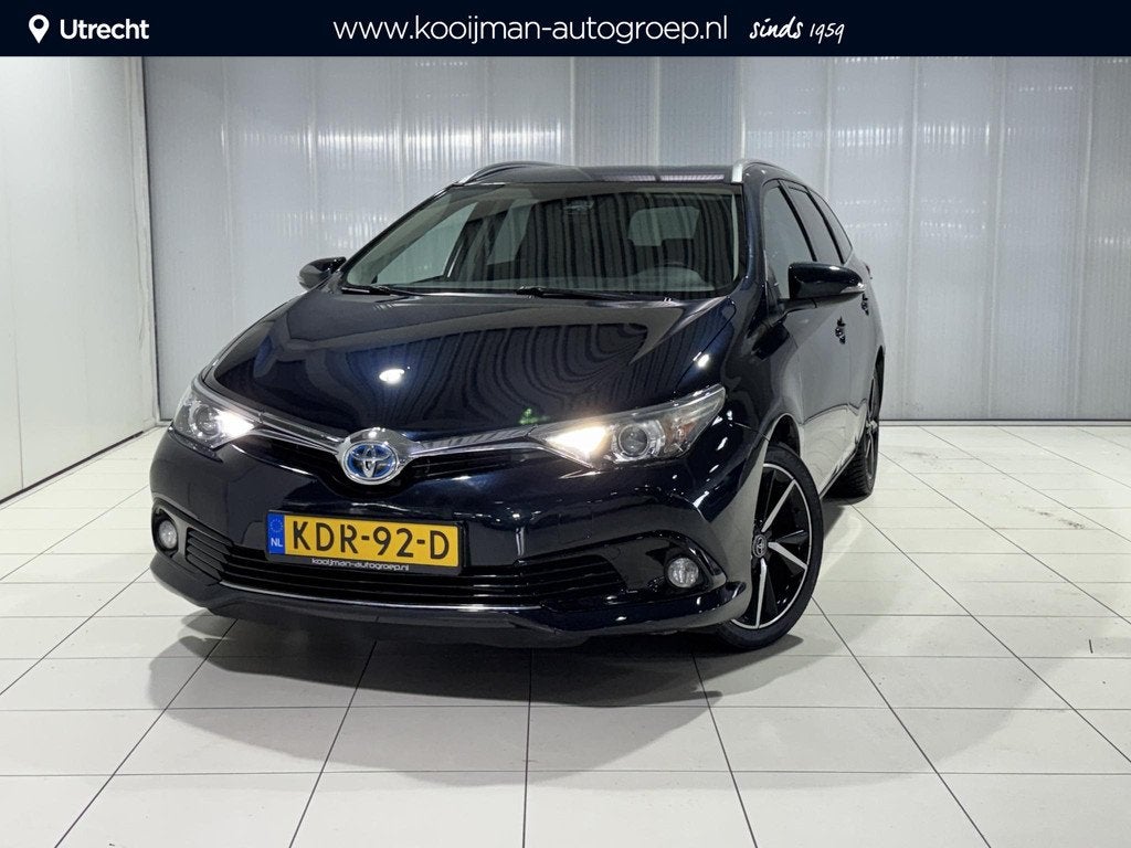 Toyota Auris 1.8 Hybrid Dynamic | All season banden met 17'', Gebruikt, Euro 6, Blauw, Hybride Elektrisch/Benzine
