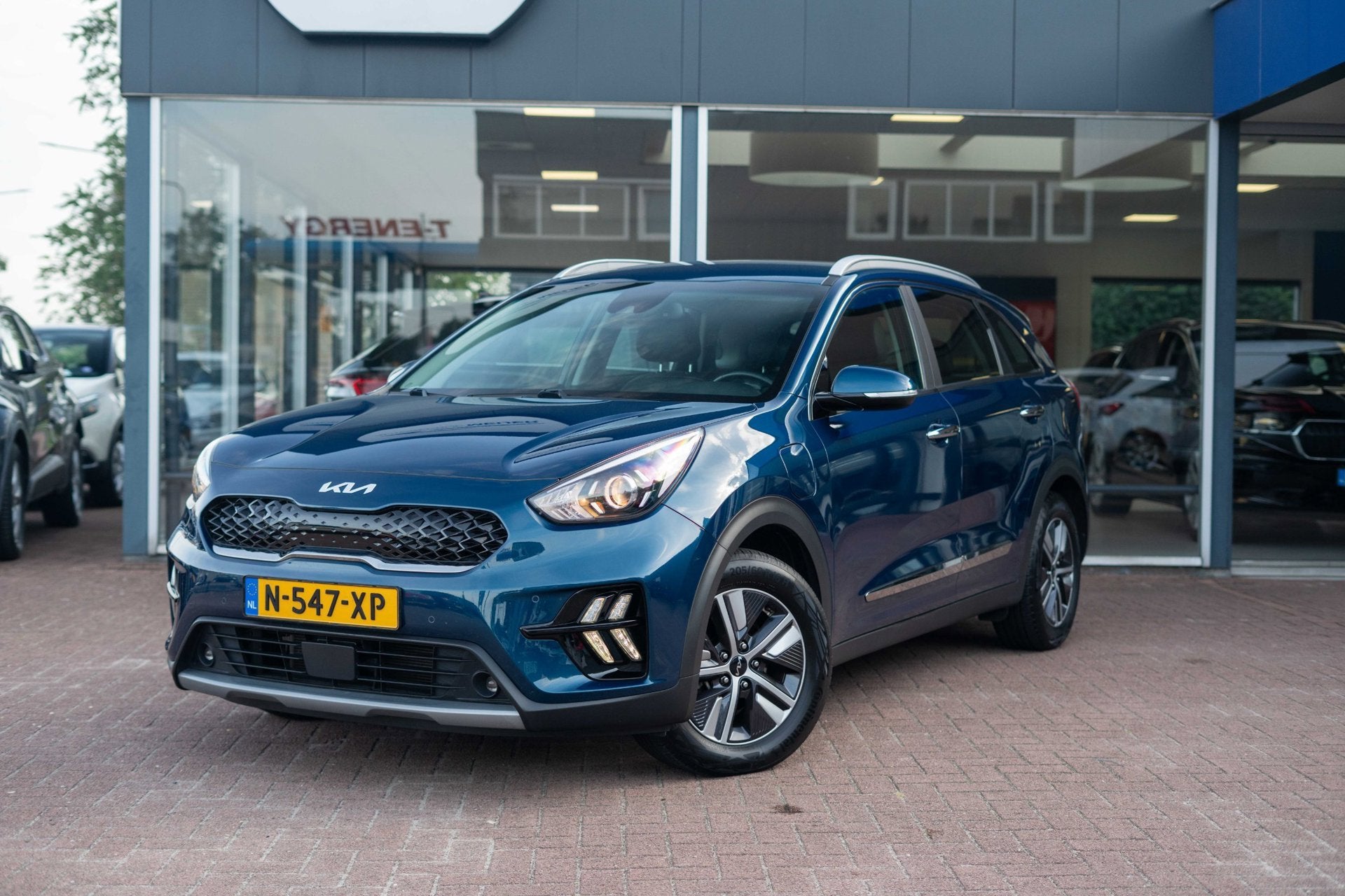 Kia Niro 1.6 GDi PHEV DynamicLine Automaat | Airco | Navigat, Auto's, Gebruikt, Euro 6, Blauw, Leder en Stof