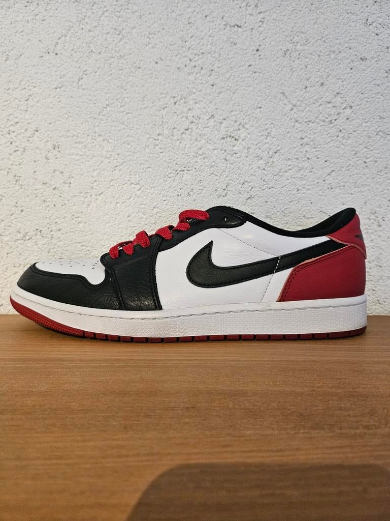 Jordan 1 low OG black toe 44.5, Ophalen of Verzenden, Zo goed als nieuw, Zwart