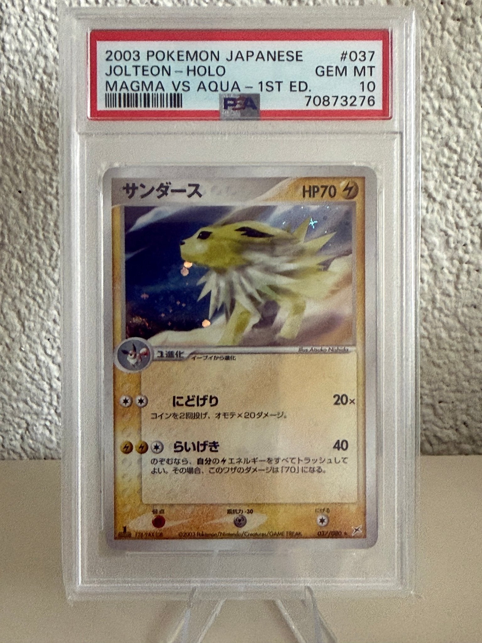 Pokemon Jolteon | PSA 10 | 037/080 | 1st Edition | 70873276, Hobby en Vrije tijd, Ophalen of Verzenden, Zo goed als nieuw, Losse kaart