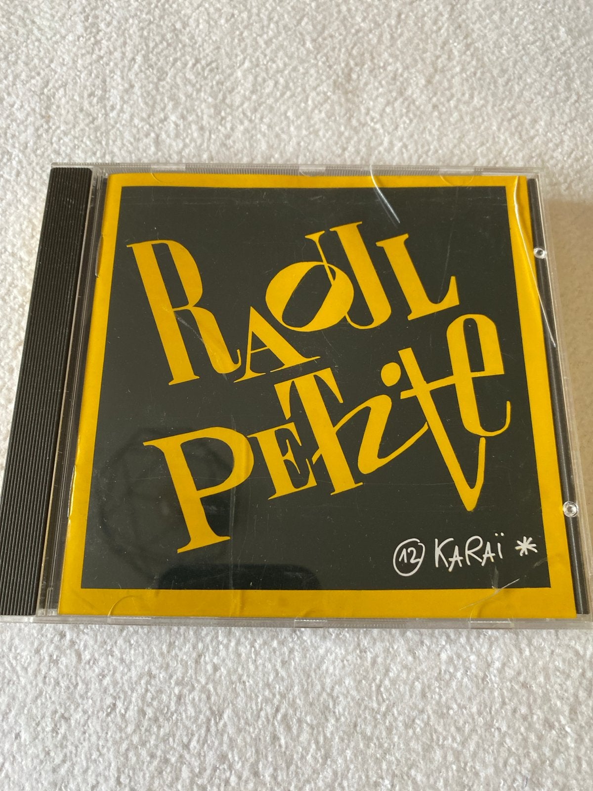 CD Raoul Petite - 12 Karai (1990), Ophalen of Verzenden, Zo goed als nieuw, Album, Inclusief doosje