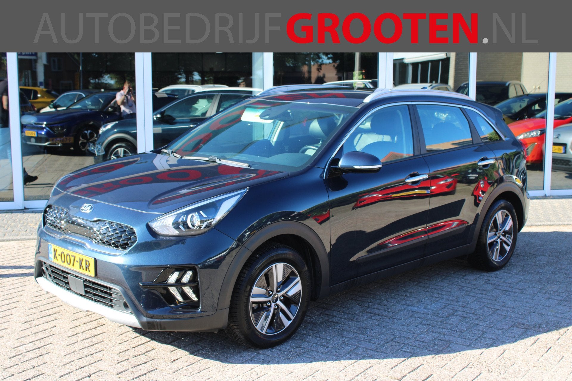 Kia Niro 1.6 GDi Hybrid DynamicLine//Trekhaak! (bj 2021), Auto's, Dealer onderhouden, Gebruikt, Blauw, Leder en Stof