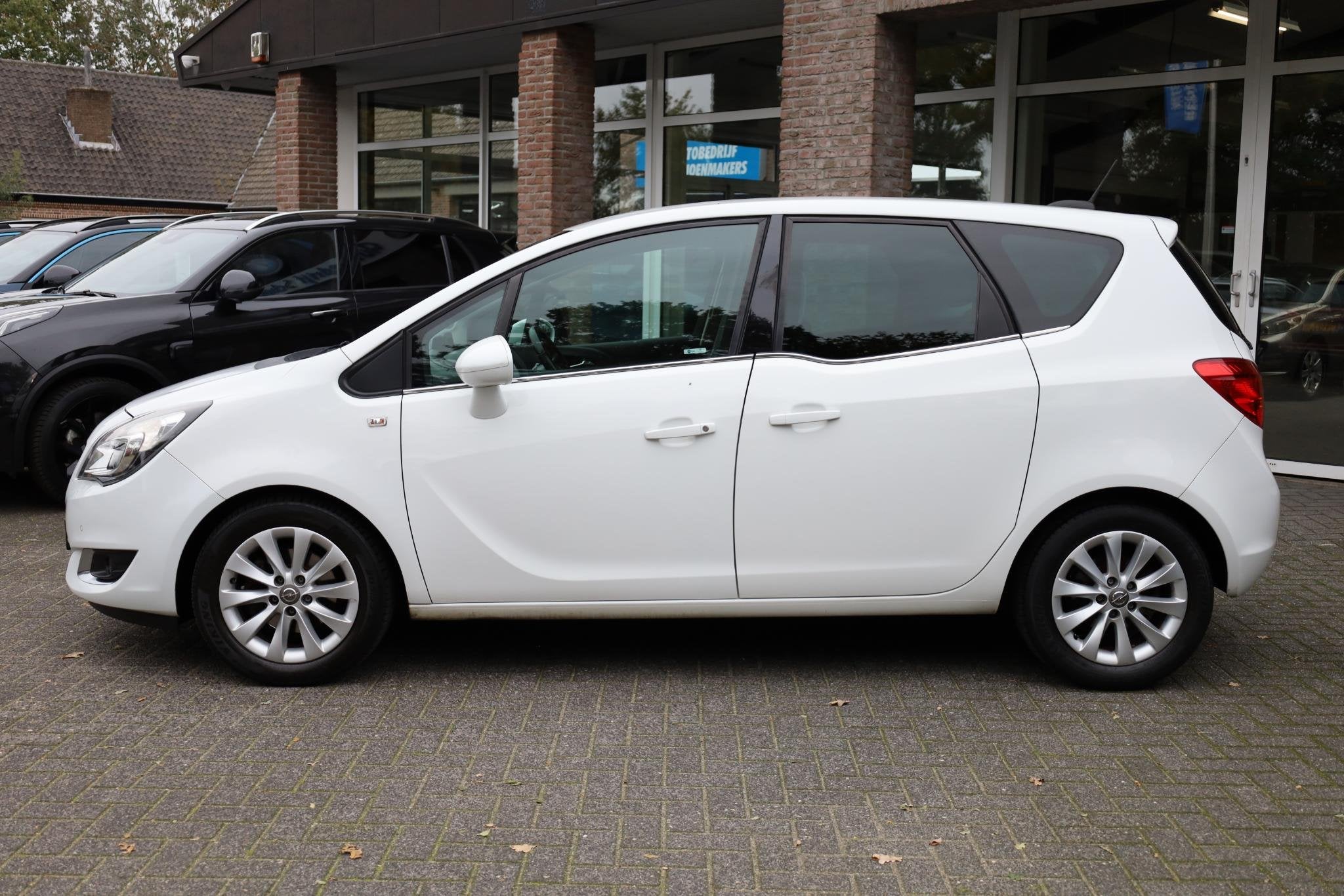 Opel Meriva 1.4 Cosmo CAMERA NAVI CRUISE CLIMA HALF-LEER 2XP, Auto's, Voorwielaandrijving, Gebruikt, 4 cilinders, 1261 kg