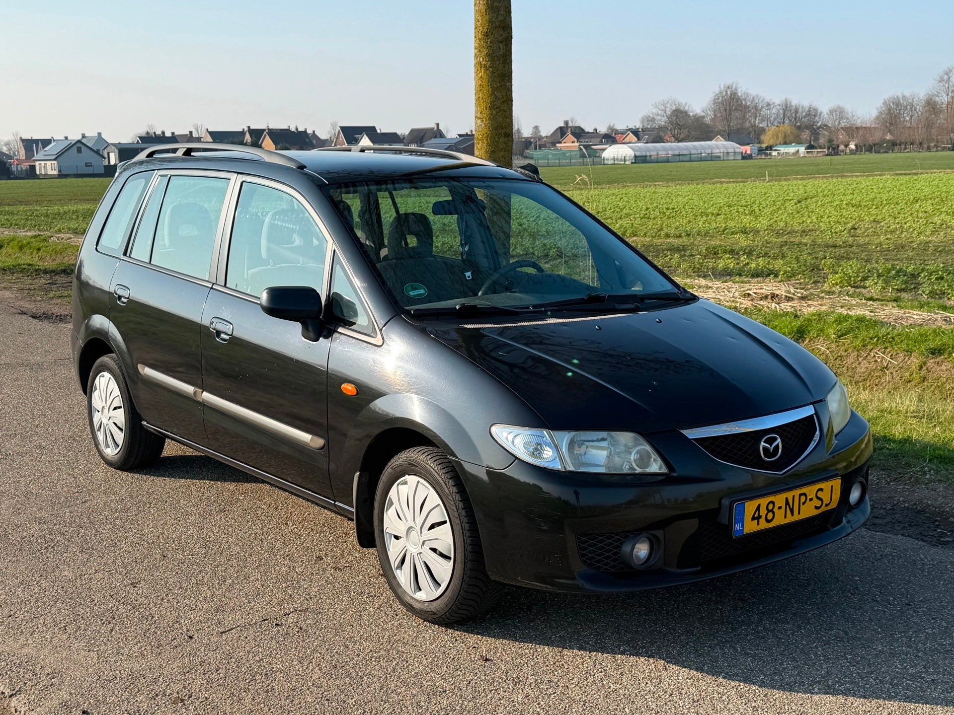 Mazda Premacy 2.0i Active Airco NAP APK 03-2027, Auto's, Stof, Gebruikt, Zwart, 4 cilinders