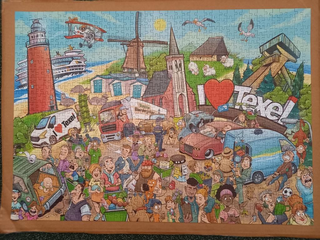Cartoon Puzzel Texel editie 1000 stukjes, Ophalen of Verzenden, 500 t/m 1500 stukjes, Gebruikt, Legpuzzel