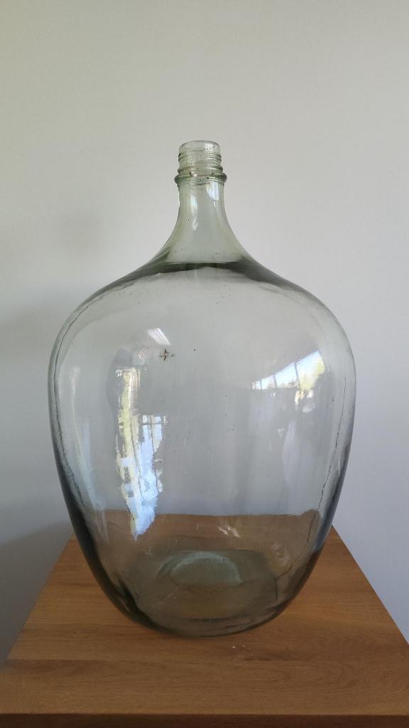 Grote glazen gistfles, Ophalen