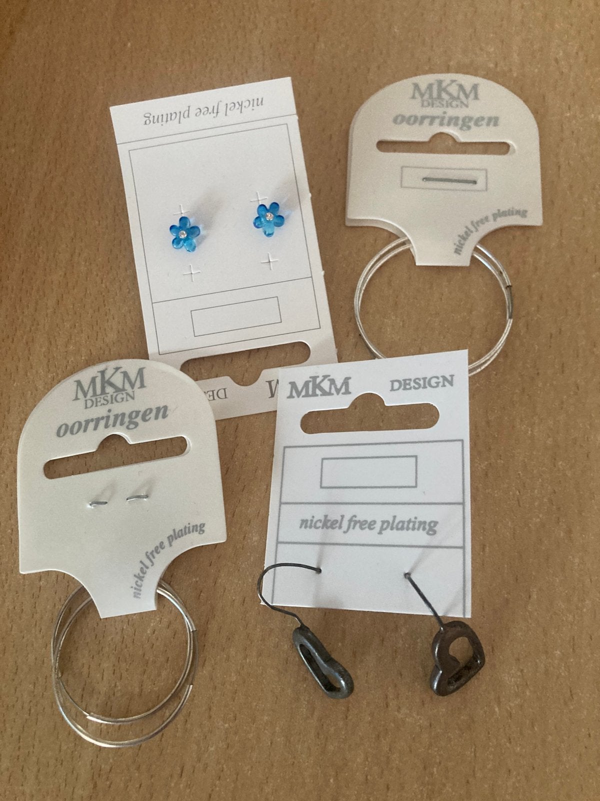 Oorbellen nieuw, ringen en knopjes, merk MKM, Overige materialen, Hangers, Nieuw, Ophalen of Verzenden
