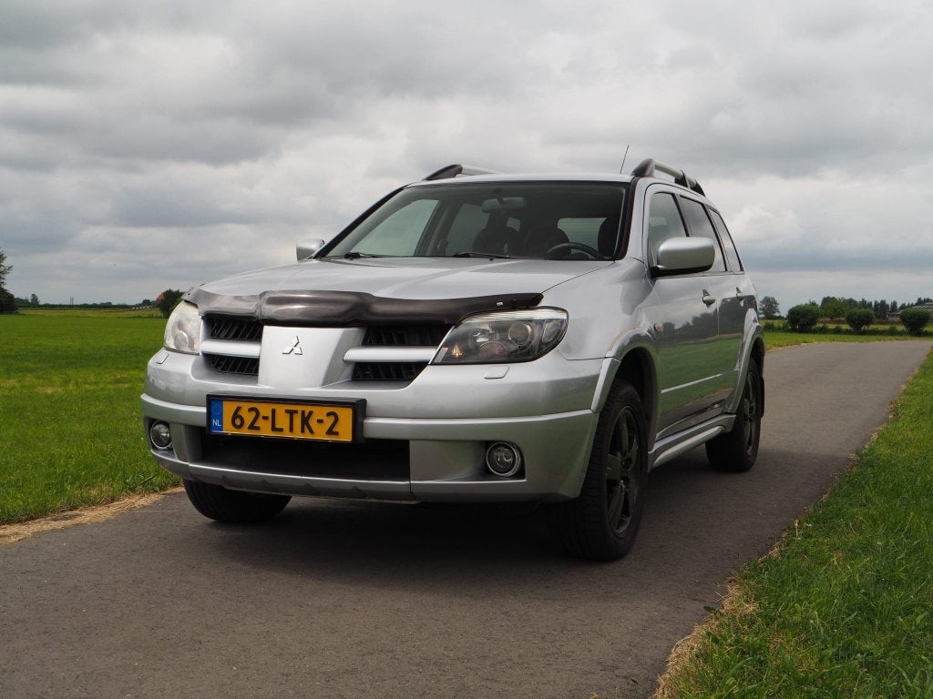 Mitsubishi Outlander 2.4 MPI 4WD AUT 2007 Grijs, Auto's, Mitsubishi, Particulier, Outlander, 4x4, Airconditioning, Bluetooth, Cruise Control