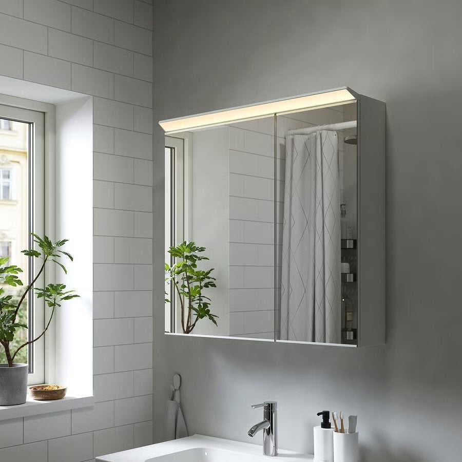IKEA TREASJÖN Spiegelkast met verlichting, Ophalen, 100 tot 150 cm, Minder dan 25 cm, Gebruikt