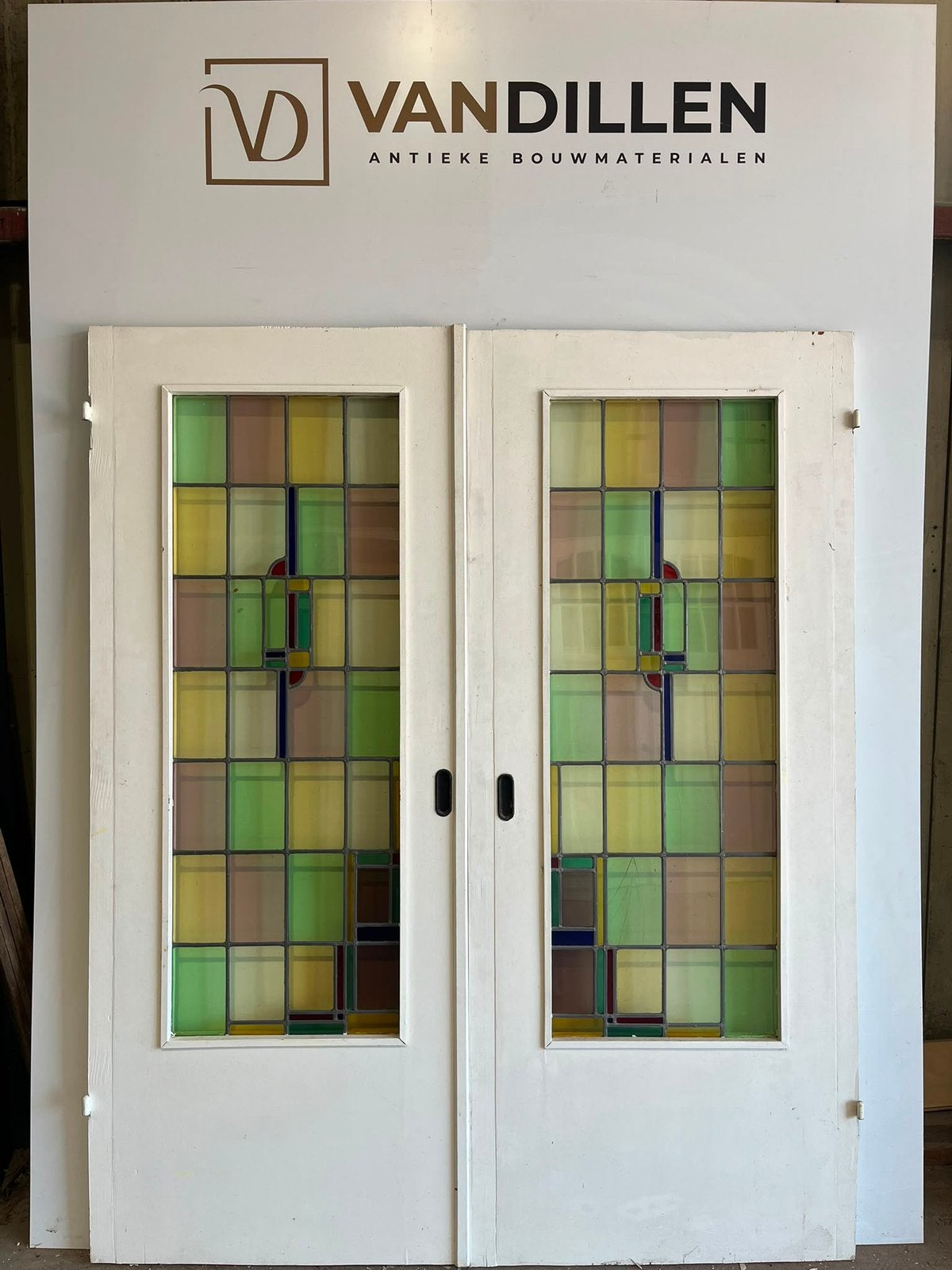 Fraaie oude ensuite vouwdeuren gekleurd glas in lood motief
