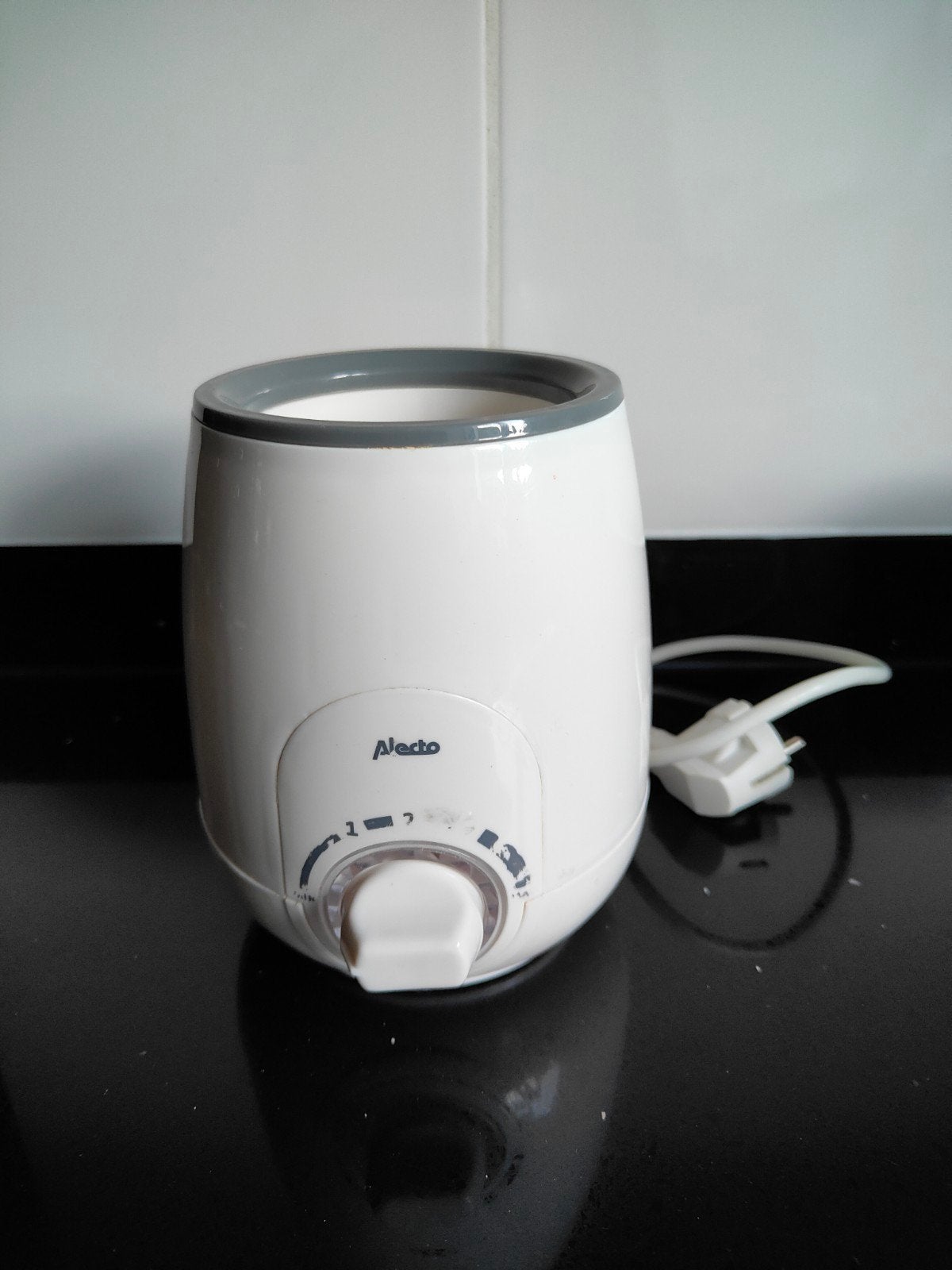 Alecto flessenwarmer, Ophalen of Verzenden, Gebruikt