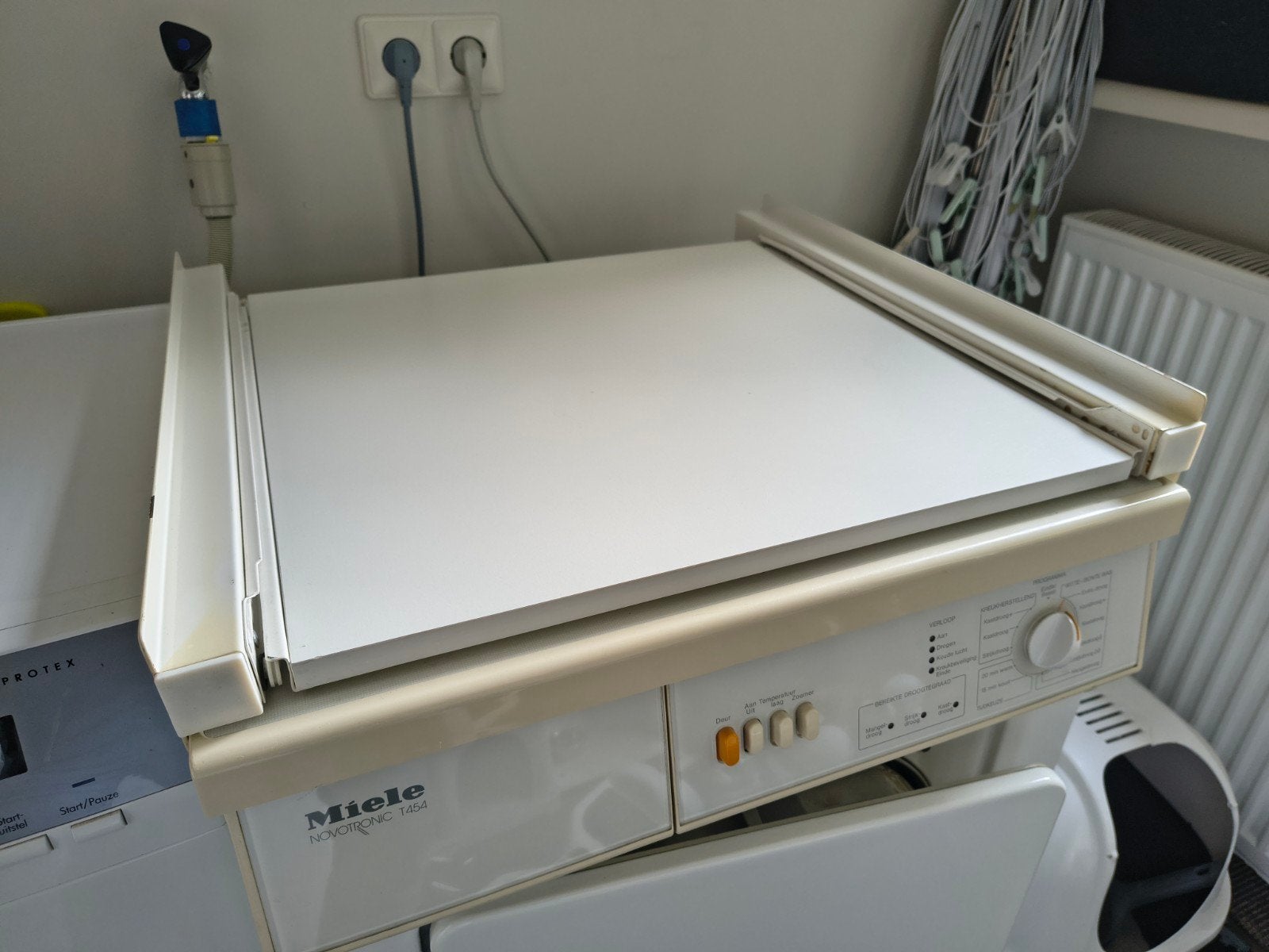 Uitschuifbaar tussenstuk voor wasmachine & droger, Ophalen