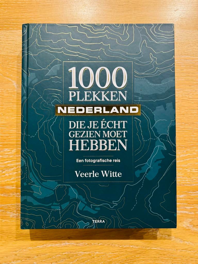 1000 plekken Nederland die je écht gezien moet hebben, Boeken, Overige merken, Ophalen of Verzenden, Zo goed als nieuw, Reisgids of -boek