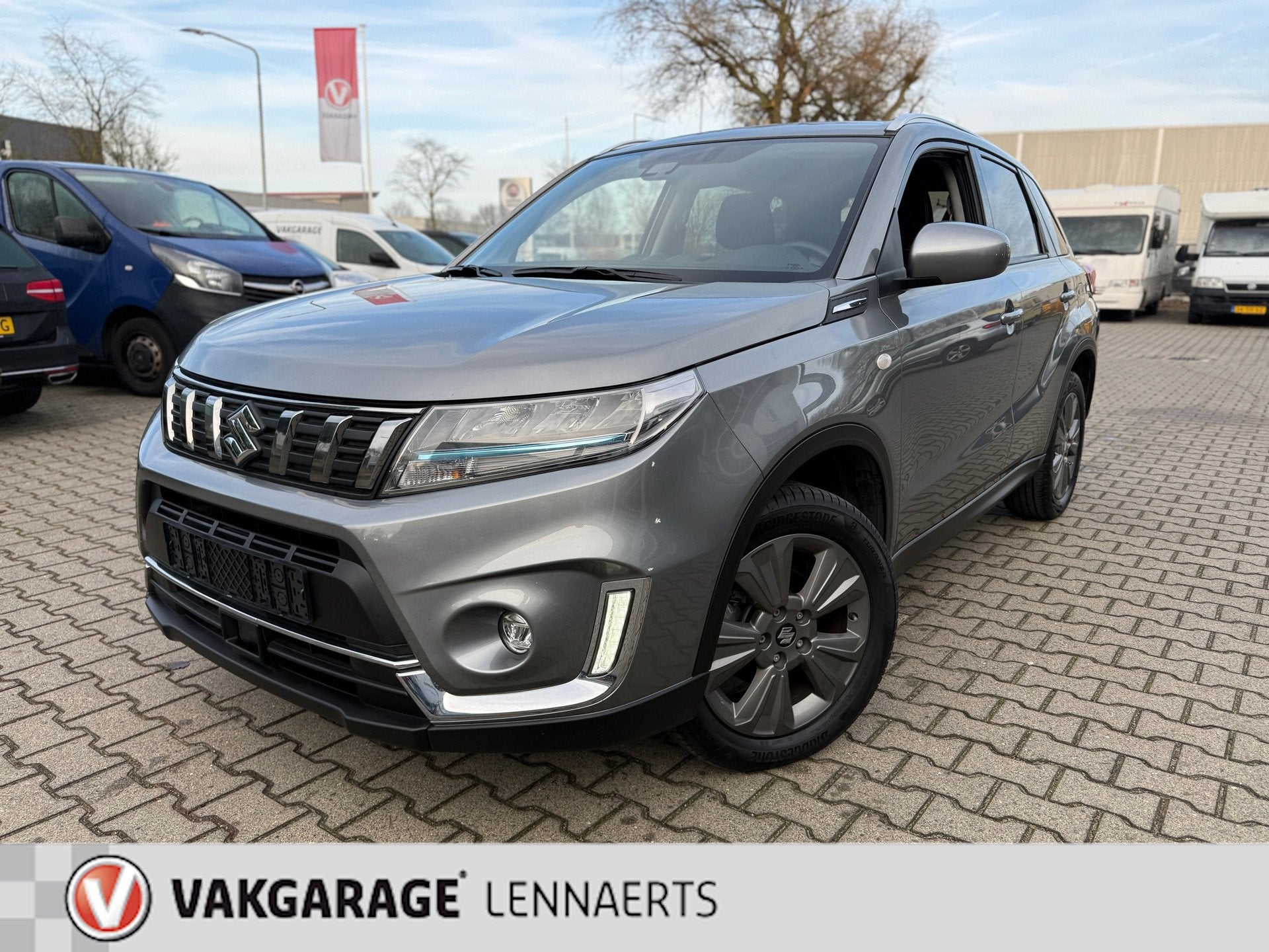 Suzuki Vitara 1.5 Hybrid Select Automaat (BOVAG/RIJKLAARPRIJ, Auto's, 12 maanden, Stof, Gebruikt, Zwart