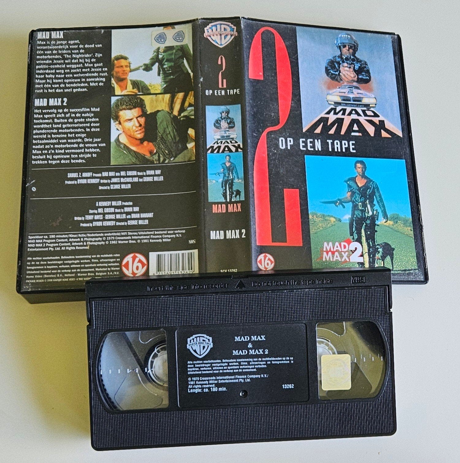 Mad Max & Mad Max 2 VHS band, Actieklassiekers, Nederlands ondertiteld, Gebruikt, Vanaf 16 jaar, Ophalen of Verzenden