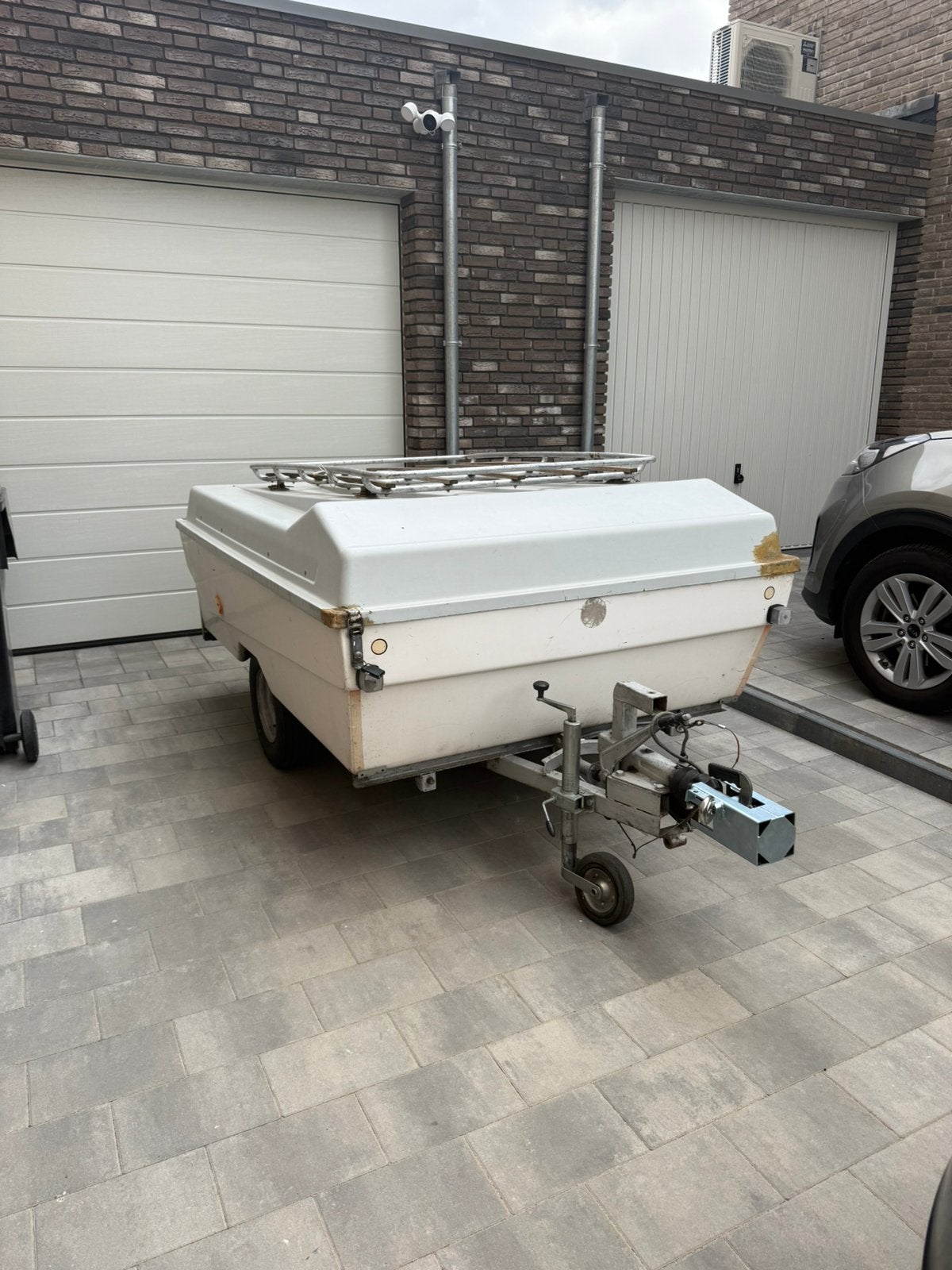Bagagewagen geremd, Ophalen