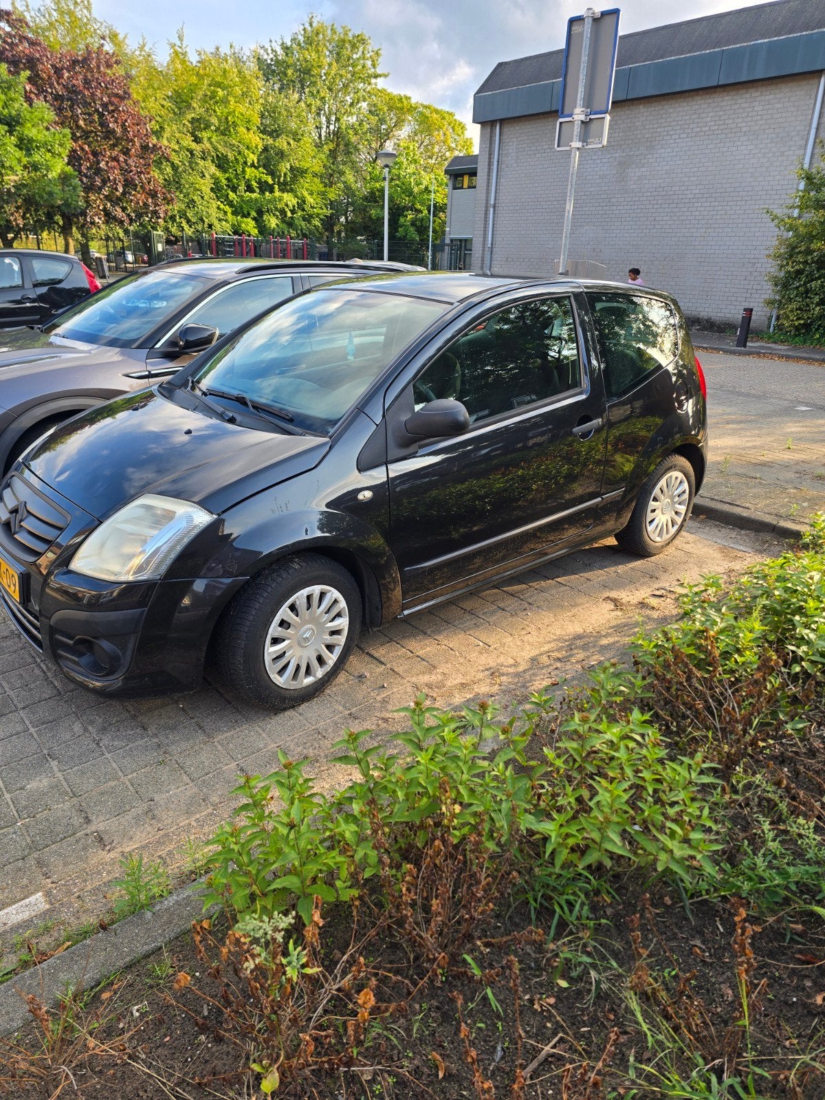 Citroën C2 1.1 I 2010 furio Zwart, Auto's, Voorwielaandrijving, 450 kg, 4 cilinders, 4 stoelen