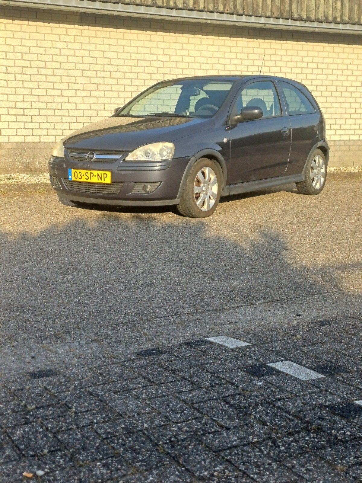 Opel Corsa 1.2 16V Twinport 3D 2006 Grijs, Auto's, Voorwielaandrijving, 31 €/maand, 4 cilinders, 1229 cc