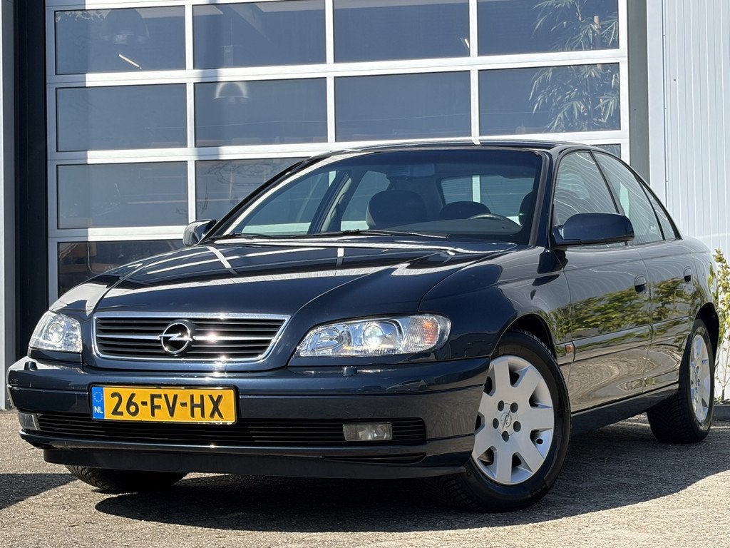 Opel Omega 2.2i-16V Elegance 145pk | Origineel Nederlands |, Automaat, 145 pk, Automatische klimaatregeling, Blauw