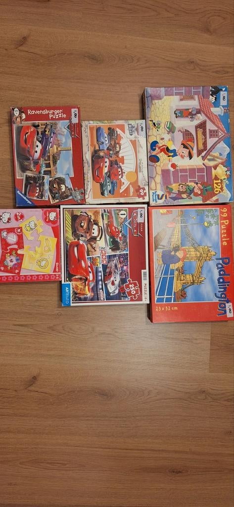 Diverse kinderpuzzels: Cars, Paddington, Hello Kitty, Kinderen en Baby's, Speelgoed | Kinderpuzzels, Ophalen, Meer dan 50 stukjes
