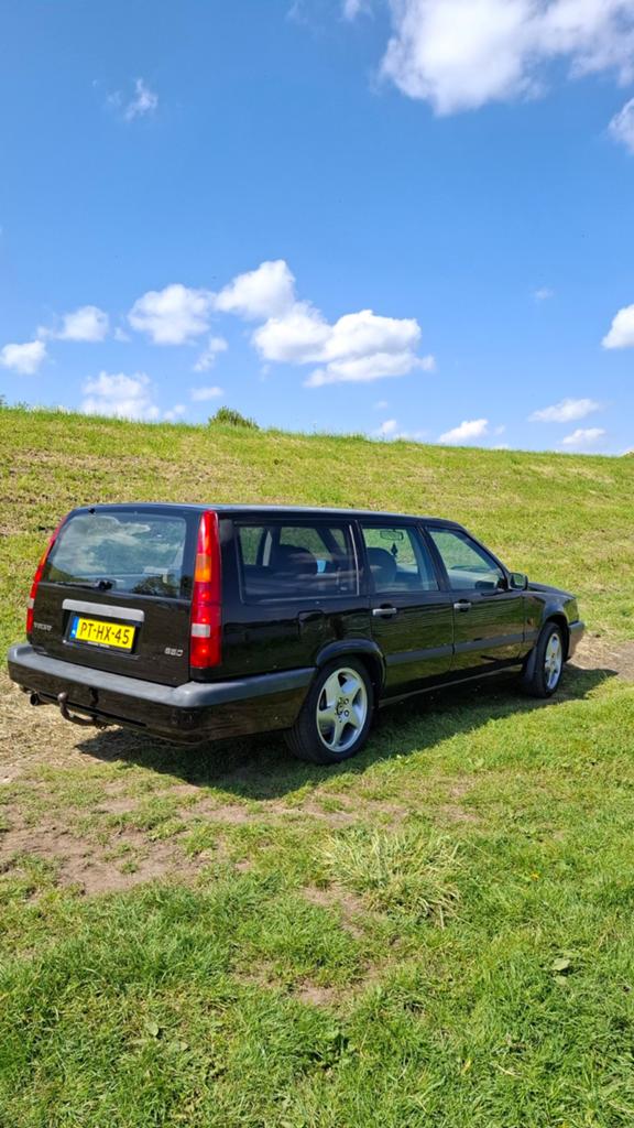 Volvo 850 2.0 I AUT 1996 Zwart, Auto's, Beige, 1984 cc, Leder en Stof, Zwart