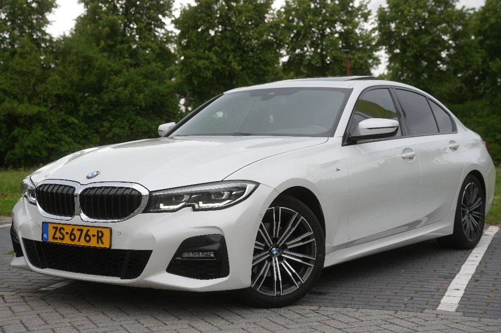 BMW 3-Serie 320i 184pk Aut 2019 Wit, Auto's, BMW, Automaat, 1998 cc, Zwart, 4 cilinders
